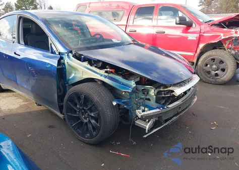 2023 Tesla Model Y Awd/Long Range Dual Motor All-Wheel Drive z USA, uszkodzony, nr VIN 7SAYGDEE1PA142167